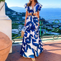 SORTYGO - Blue Leaf Print Cut-Out Maxi Dress in Blue