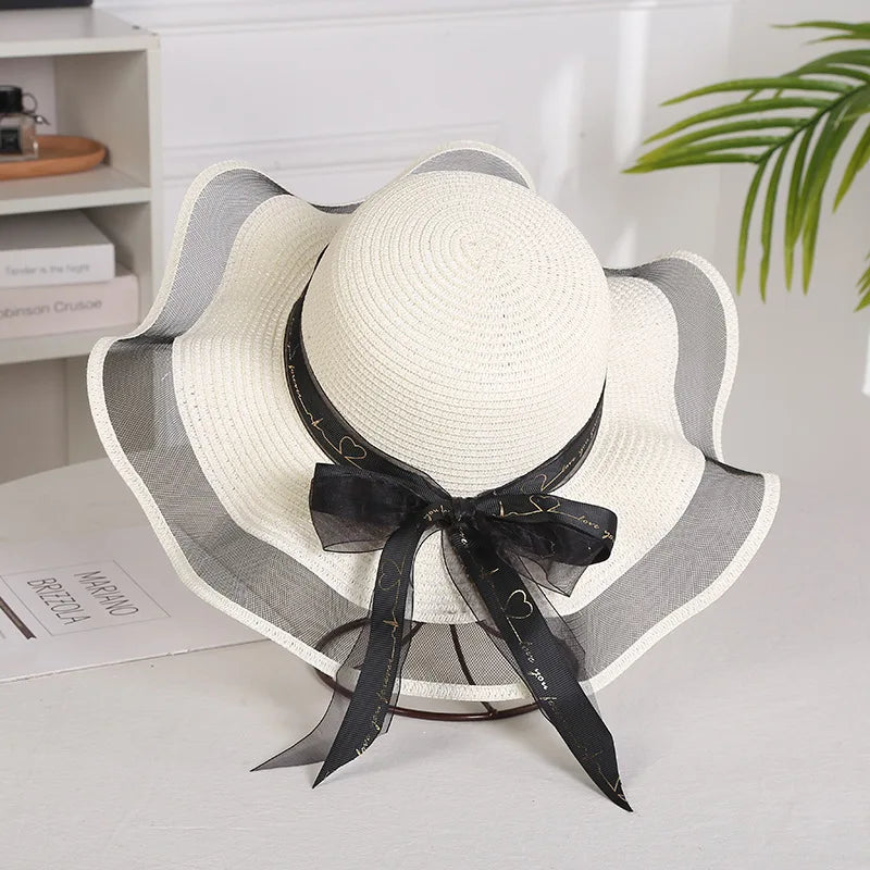 SORTYGO - Elegant Summer Sun Hat with Ribbon Bow in WHITE