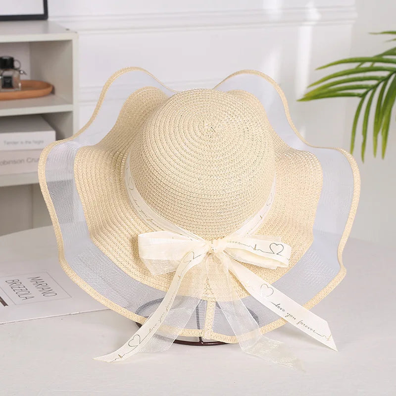 SORTYGO - Elegant Summer Sun Hat with Ribbon Bow in Beige